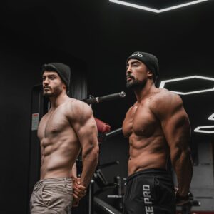 bodybuilders showing body benefits of performance enhancement supplements